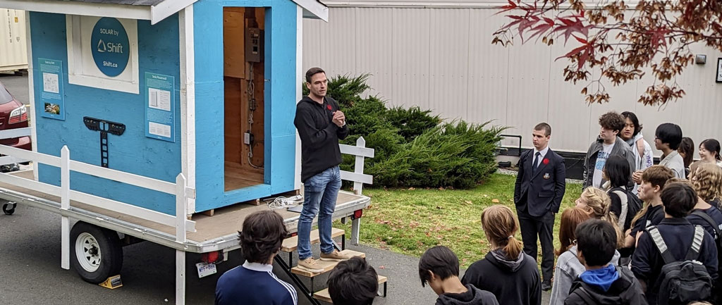 A person speaking to students