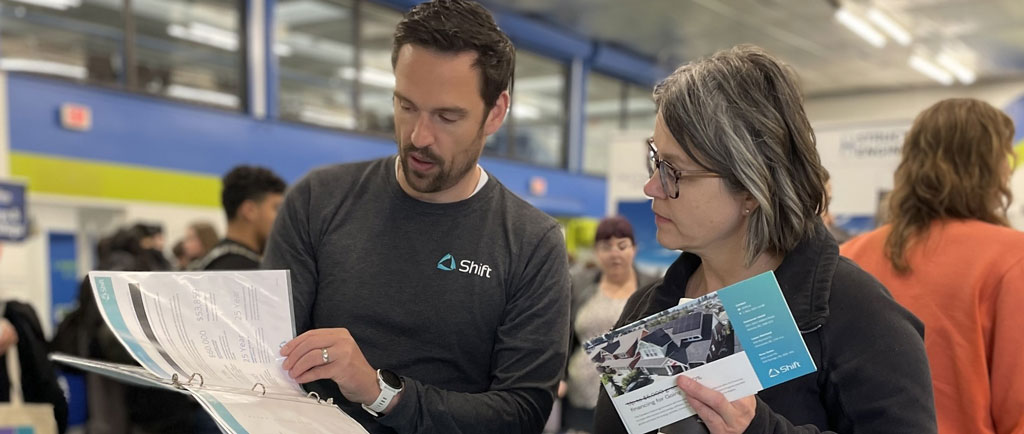 A photo of a person talking to another person and solar